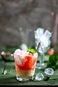 A Strawberry Kiss cocktail made with strawberry purée, cream and orange juice