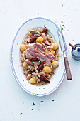 Alsace sauerkraut with apple, potatoes, sausage and bacon