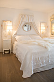 Vintage-style bedroom decorated entirely in white