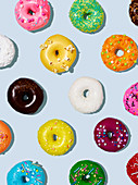 Lots of colourful glazed doughnuts
