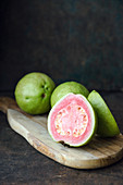 Guavas on a chopping board
