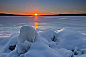 Winter Sunset on frozen Lake