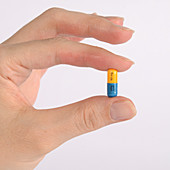 Strattera 60mg Pill in Hand