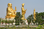 Golden statues at the Chinese Cultural Centre