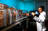 Molecular Biologist Holding Yeast Genome Microarray