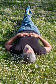 Man relaxing on grass