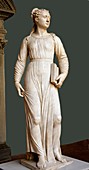 Sculpture of a woman holding a tablet