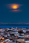 Blue Moon rising over Lisbon