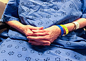 Elderly female patient in a hospital gown
