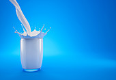 Milk pouring into a glass with crown splash, illustration