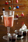 A cold milk drink with homemade chocolate syrup for Christmas