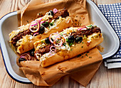 Greek-style hot dogs with bifteki and tzatziki feta cream