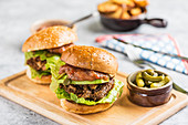 Burgers with avocado and gherkins