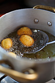 Ricotta balls being fried