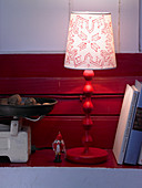 Lampshade painted with red snowflake motif