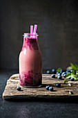 Blueberry smoothie in a bottle