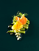 Risotto cubes with green asparagus and salmon (molecular gastronomy)