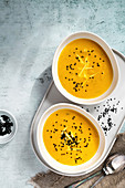 Vegan ginger soup with black sesam