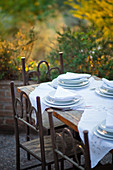 A table laid on a restaurant terrace (Italy)