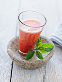A strawberry, rhubarb and pomegranate smoothie