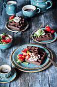 Chocolate waffles with strawberries