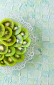 Stacked kiwi slices on a plate