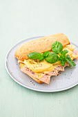 Ciabatta with sliced turkey breast, pineapple and cheese