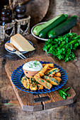 Zucchini fritters with sour cream