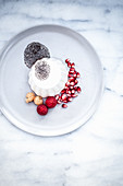 Panna cotta with chia seeds and pomegranate