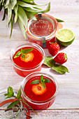 Jars of pineapple and strawberry jam