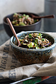 Lentil salad in rustic ceramic bowls