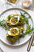 Sandwiches with avocado, egg and dukkah