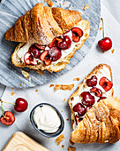 Croissants with philadelphia cheese and sweet cherries