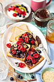Date and prune Nutella on toast with fruit
