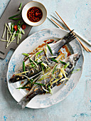 Steamed fish with ginger and spring onions (Canton, China)
