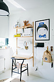 Designer chair at fold-down desk in child's bedroom