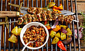 Grilled Andalusian lamb skewers with a vegetable relish and grilled vegetables