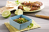 An oriental marinade with grilled beef steals and unleavened bread