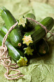 Organic courgettes with kitchen twine