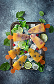 Mango lollies with blueberries