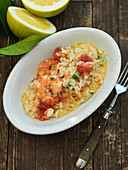 Grapefruit risotto with scampi