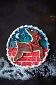 An artistically decorated Christmas biscuit with a reindeer