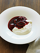 Quark mousse with red wine plums