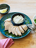 Cooked chicken breast with herb mayonnaise