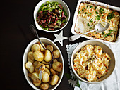 Sage roast potatoes, Celeriac gratin, Savoy cabbage with chestnut butter and pancetta, Root mash with mustard butter
