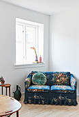Vintage-style, blue, floral two-seater sofa
