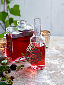 Cranberry and clementine vodka and blackberry gin