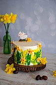 A mini Easter cake with peach liqueur and an Easter lamb