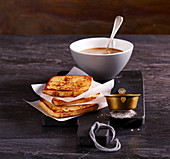 French toast with cinnamon sugar with a café au lait