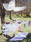 A covered easter table in a garden
